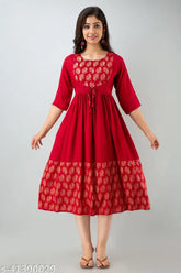 Red flared rayon printed kurta with three-quarter sleeves, Indian women's fashion