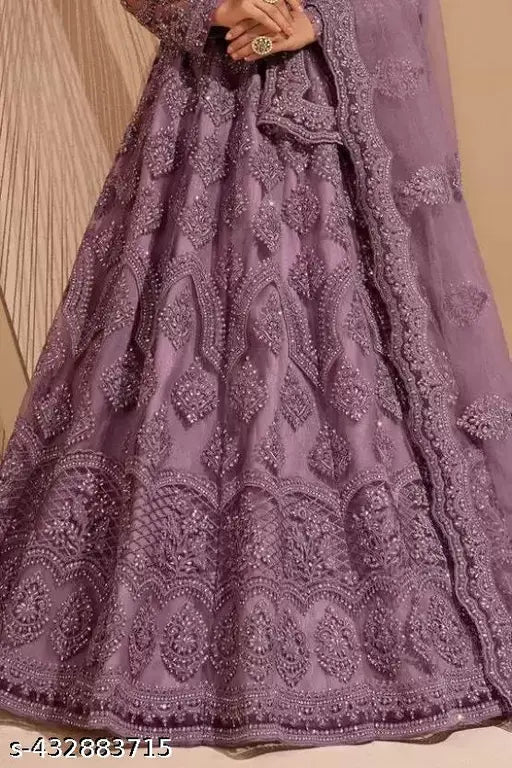 Purple traditional semi-stitched embroidered lehenga choli set with net fabric, perfect for girls and women's festive wear, intricately embroidered from India