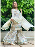 Jaipuri printed kurti sharara dupatta set with matching bottomwear, rayon fabric, three-quarter sleeves, vibrant Indian print
