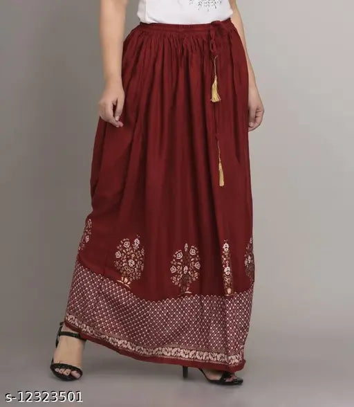 Designer Unique Women's maroon flared silver print skirts, rayon fabric, elasticated waist, tassel detailing - India