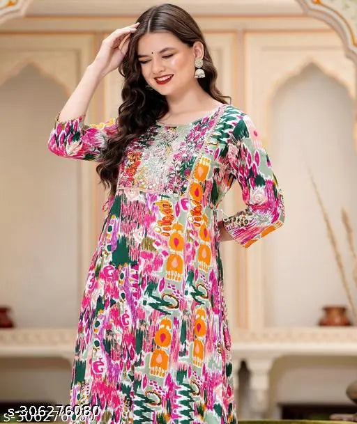 Shiny sequin-embellished rayon Anarkali kurta, traditional Indian wear with three-quarter sleeves. Sizes: S (36" bust, 48" length), M (38" bust, 48" length), L (40" bust, 48" length), XL (42" bust, 48" length), XXL (44" bust, 48" length), XXXL (46" bust, 48" length)