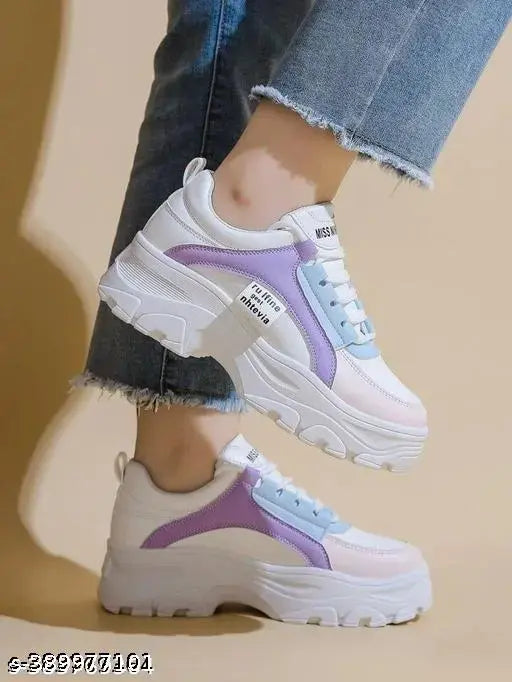 Multi-colored mesh sneakers for women and kids, featuring a rubber sole and lace-up fastening. Trendy footwear, available in sizes 3-8, made in India