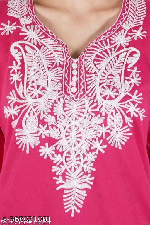 Pink embroidered A-Line wool kurta with three-quarter sleeves, perfect winterwear for women. Embroidered woolen kurta from India