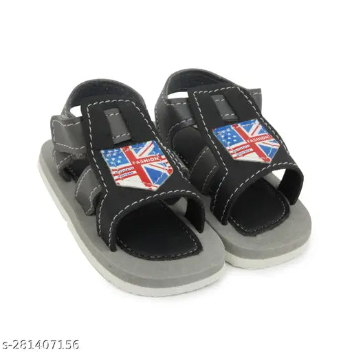 Black and grey EVA soled baby sandals with musical print, ideal for 0-6 months, easy Velcro closure