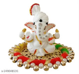 White pagadi Ganesh Ji and gold-plated brass Akhand Lotus/Kamal Diya with diamond crystals, decorative brass oil lamp for Puja. Polyresin material, 10cm x 7cm x 10cm size. Made in India