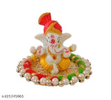 Multi-colored polyresin Ganesha idol on Aasan, handcrafted decorative showpiece - ideal for car dashboards or home decor, 9cm tall, elegant gift from India