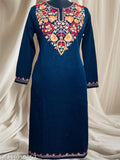 Black woolen kurta with Kashmiri embroidery, three-quarter sleeves, chikankari pattern. Exquisite handwork adds traditional flair to cozy silhouette. Perfect for casual outings and special occasions