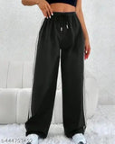 White cotton blend solid net trouser pant with stripes, perfect for lounge or sleepwear. Soft and comfortable, featuring two pockets and elastic waistband. Made in India