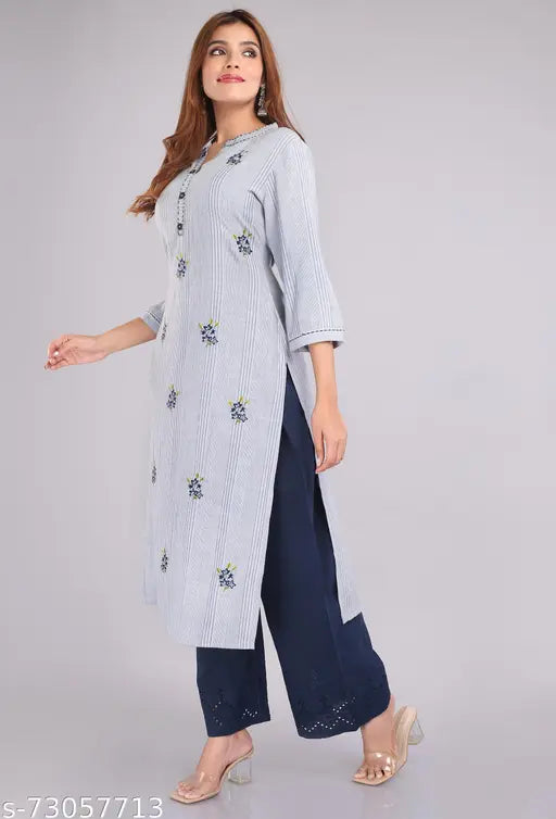 Stylish rayon kurta with cotton palazzos, three-quarter sleeves, printed net design. Indian rayon kurta set on mannequin