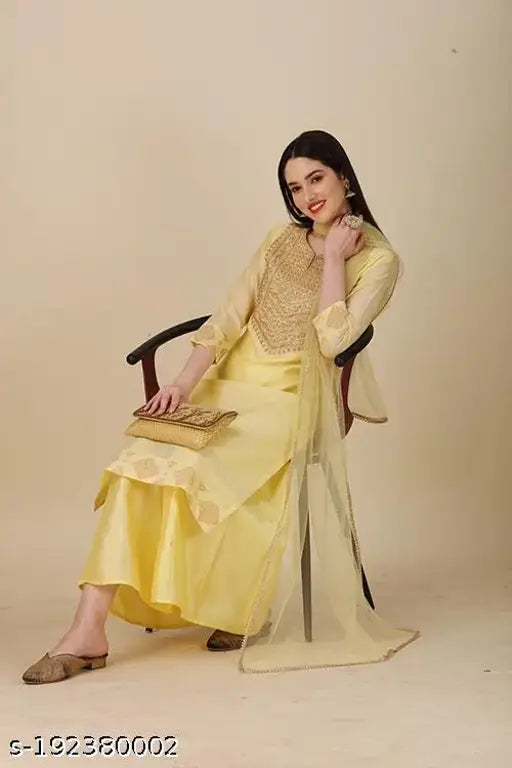 Yellow Chanderi Cotton Kurta Set with Palazzo and Dupatta, featuring gold prints and lace ornamentation, ideal for festive, traditional, wedding wear