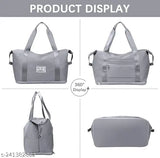 Grey foldable travel duffel bag (Sprqcart Pack of 1), lightweight waterproof and durable polyester. Large capacity for yoga, women, girls, perfect for traveling or gym sports. Solid pattern with two pockets and one inside patch pocket