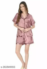 Red satin night suit set for women, short sleeves and shorts with contrast detailing. 100% silky satin fabric, perfect for sleepwear or bridal gifts." (114 characters)