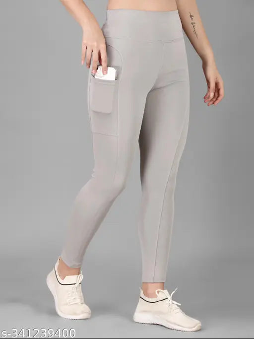 Stretchable polyester high-rise ankle-length yoga pants for women, pack of 2 - ideal for gym and work, featuring pockets. Available in sizes 28, 30, 32, 34, 36, 38 (inches). Made in India