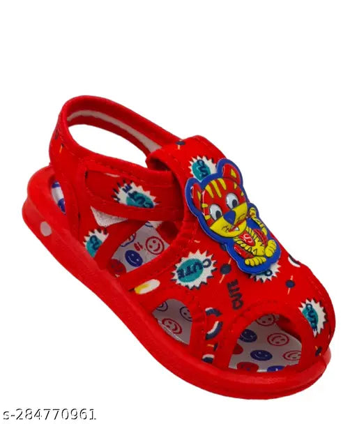 Classic canvas kids' sandals in various sizes (6-9M, 9-12M, etc.), featuring PVC sole and Velcro fastening, ideal for boys with cartoon patterns