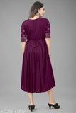 Purple Rayon embroidered kurti with three-quarter sleeves. Traditional Indian clothing for festivals, parties, or weddings