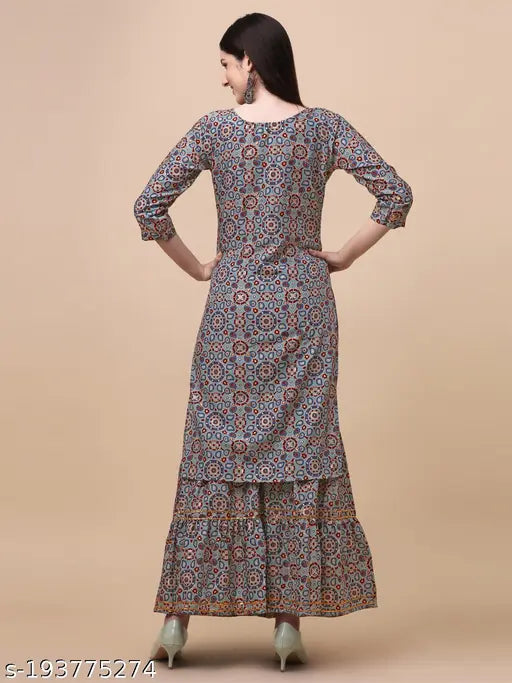 Poly silk Graceful Women Kurta Sarara Set with three-quarter sleeves, printed net design on display. Single size available in S, M, L, XL, XXL. Made in India