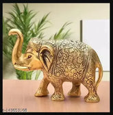Gold brass elephant showpiece (13x9x5 cm), handcrafted by VK Collection, enhances home decor