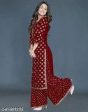 Maroon rayon straight kurta with palazzo set, featuring Hena Khan design and gold printed three-quarter sleeves. Indian women's fashion accessory on display