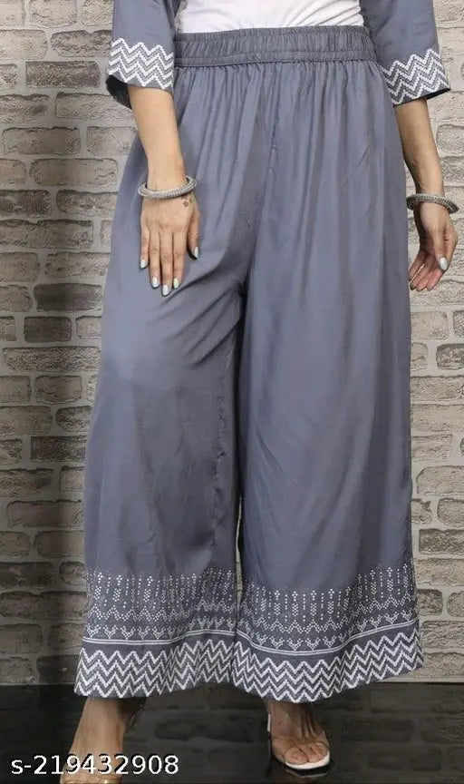 Grey rayon printed plazzo kurta with three-quarter sleeves, rayon bottomwear. Ethnic rayon print for women's A-line long kurti and palazzos