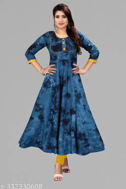 Navy rayon anarkali kurti with dori patched design, three-quarter sleeves. Comfortable cotton lining, versatile style for office or special occasions. Indian designer dress