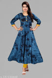 Navy rayon anarkali kurti with dori patched design, three-quarter sleeves. Comfortable cotton lining, versatile style for office or special occasions. Indian designer dress