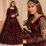 Embroidered lehenga choli set in net fabric, semi-stitched (Sizes: 42" waist, 42" length), adorned with intricate patterns, India