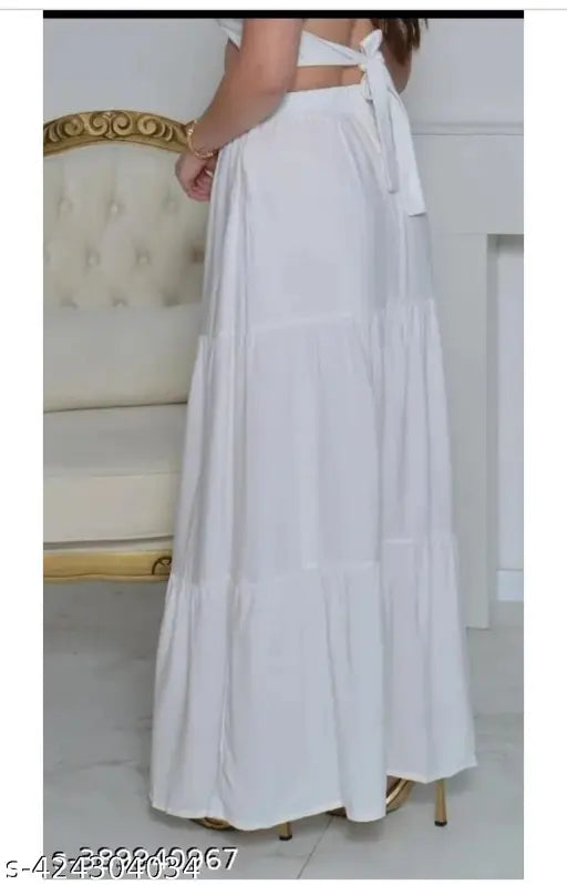 White rayon long skirt, attractive design by SHREE LILADHAR FASHION, fits sizes 26-Free Size