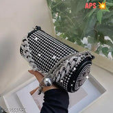 Black and silver embellished canvas satchel bag with rhinestones, European and American retro style. Features a bucket shape, zipper pocket, ID pocket, and chain handle. Three-dimensional bag from China