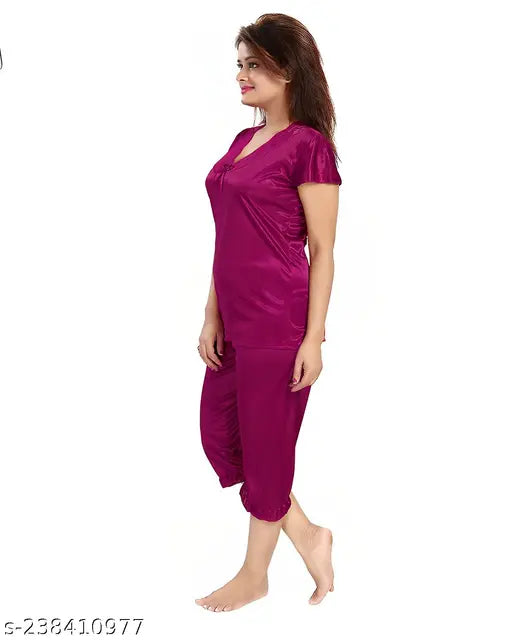 Soft satin capri night suit set for women's sleepwear & loungewear, solid satin fabric in a short sleeve top & shorts style from Nightdoll brand, ideal for special nights or bedroom wear. Made in India