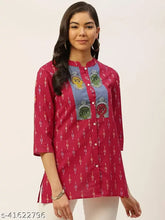 Trendy cotton printed Ikat kurti top with mandarin collar, 3/4 sleeves and button detail. Indian western wear for casual, festive, and party occasions." (107 characters)