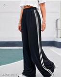 Black cotton printed stripe women's jogger pants with fancy design, net pattern detail on mannequin