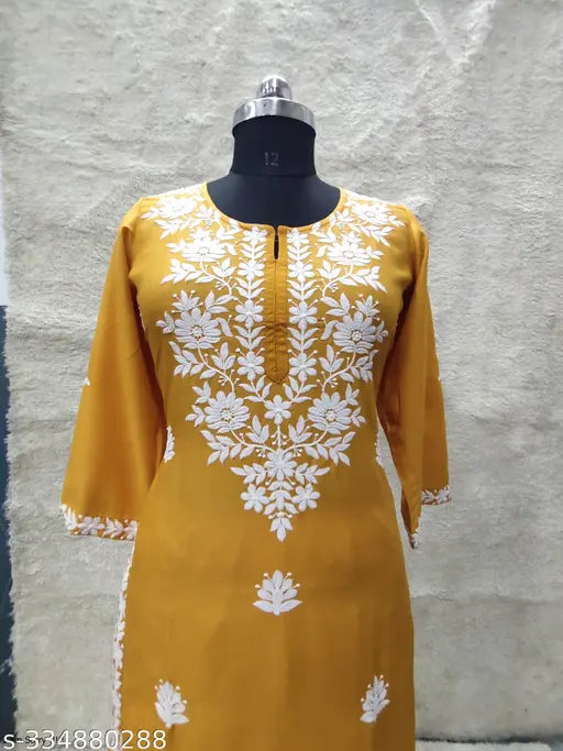 Rayon Chikankari embroidered straight calf length kurta and plazo, featuring floral detail, three-quarter sleeves, and round neck. Indian handcrafted rayon bottomwear