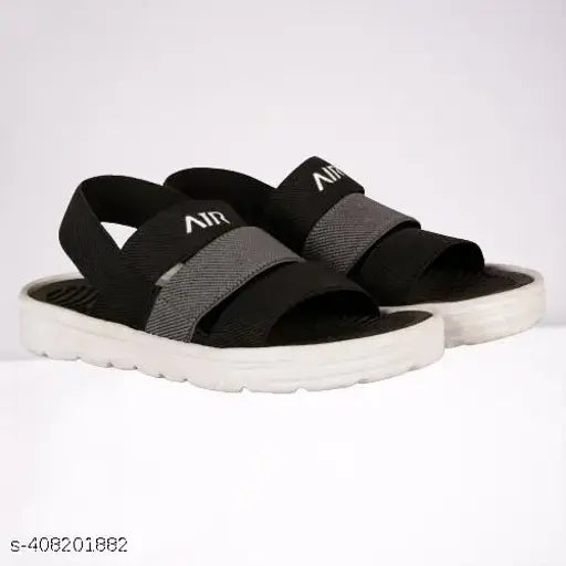 Black EVA and PU slip-on striped net sandals for boys, ideal for summer friendly footwear with breathable, adjustable fabrics and air cushion outsoles for comfortable and durable wear. Made in India