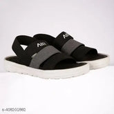 Black EVA and PU slip-on striped net sandals for boys, ideal for summer friendly footwear with breathable, adjustable fabrics and air cushion outsoles for comfortable and durable wear. Made in India