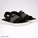 Black EVA and PU slip-on striped net sandals for boys, ideal for summer friendly footwear with breathable, adjustable fabrics and air cushion outsoles for comfortable and durable wear. Made in India