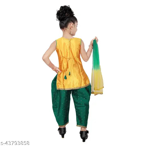 Silk blend Patiala suit for kids, self-designed with dupatta. Ideal for parties, weddings, and special occasions like Diwali, Navratri, or Christmas." (118 characters)