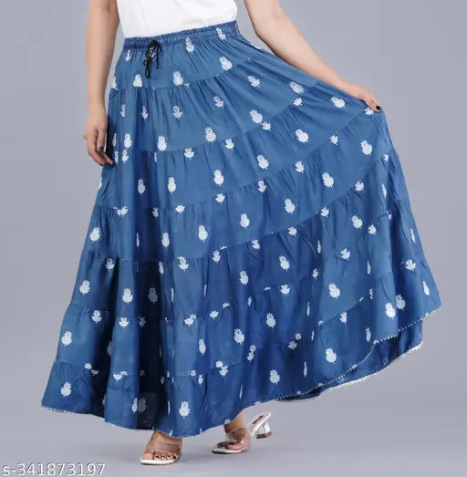 Rayon printed floral long skirt with drawstring and tassels, all-over elasticated waist band. Women's size 34-Free Size. Indian-made fashion skirt for women