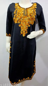 Stylish black & yellow embroidered woolen kurti, three-quarter sleeves. Indian women's fashion, perfect for day, wedding, casual, office, or evening wear