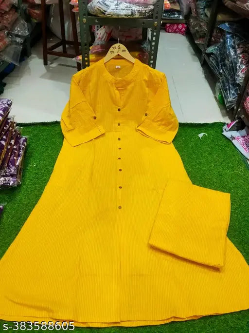 Embroidered cotton kurta set with matching bottomwear, three-quarter sleeves, S-XXXL sizes. Indian handcrafted traditional wear on display