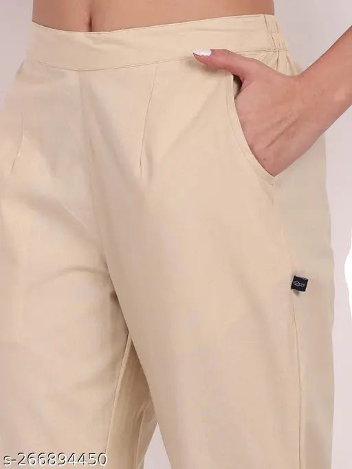Solid beige cotton pants with elasticated waistband and two pockets, suitable for sizes 27-XXL, made in India