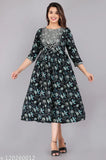 Rayon floral print kurti, three-quarter sleeves, traditional Indian craftsmanship. Perfect for stylish casual wear by VASHINEH." (124 characters)
