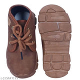 Brown canvas casual shoes for kids, ideal for parties and weddings. Lace-up fastening, comfortable EVA sole. Solid design, sizes from 9-12 months to 3-3.5 years. Made in India