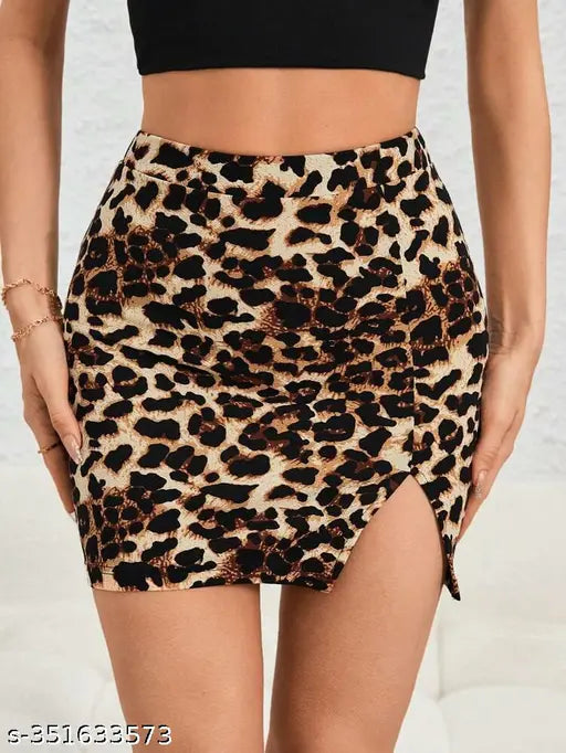 Black knitted mini printed bodycon skirt for woman, semi-sheer with split neckline and high stretch. Available sizes: 26 (waist 26in, length 15in, hip 30in), 28 (waist 28in, length 15in, hip 32in), 30 (waist 30in, length 16in, hip 34in), 32 (waist 32in, length 16in, hip 36in). Made in India