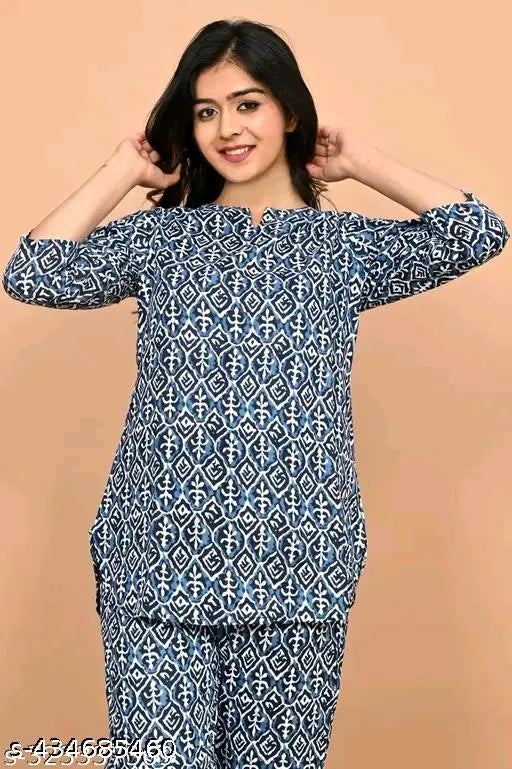 Designer printed rayon night suit, three-quarter sleeve pyjamas with intricate patterns on display