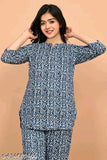 Designer printed rayon night suit, three-quarter sleeve pyjamas with intricate patterns on display