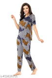 Large print polycotton women's night suit with short sleeves, featuring a colorful pattern. Available in M, L, and XL