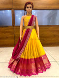 Litchi Silk half saree for girls, embellished with embroidery work on net dupatta and sleeveless blouse. Traditional Indian free size attire with tussled edges and a matching belt." (125 characters)