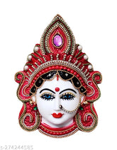 Red plastic Maa Lakshmi face god idol for prosperity and worship, approximately 15x13x4 cm