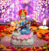Multicolor small Maa Saraswati resin idol for spiritual home decor, office, or car, intricate detailing, India origin