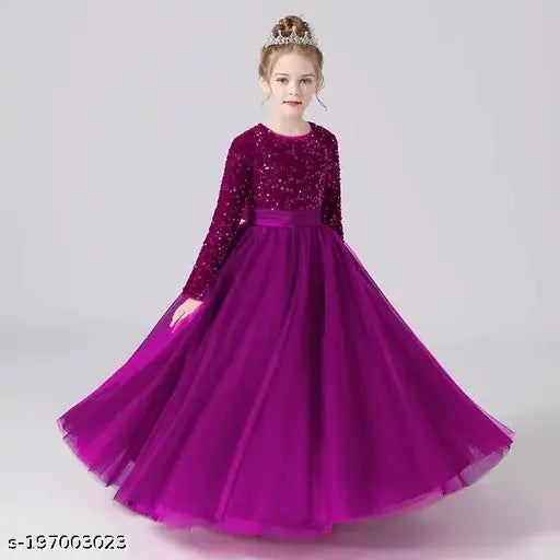 Embellished net sequence gown dress for girls aged 5-16, featuring long sleeves, sequin work on velvet, and soft touch nylon net bottom. Indian origin